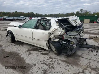 2004 Acura RL w/Navigation System with VIN JH4KA96684C001230, listed as a Copart auction lot 74801074 with 151,266 mi miles and Salvage Title. Bid and sale history available at carsss.com. Image 2.