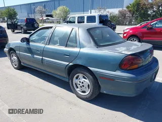 1998 Pontiac Grand Am SE with VIN 1G2NE52M2WC712123, listed as a IAAI auction lot 41939392 with 307,145 mi miles. Bid and sale history available at carsss.com. Image 3.