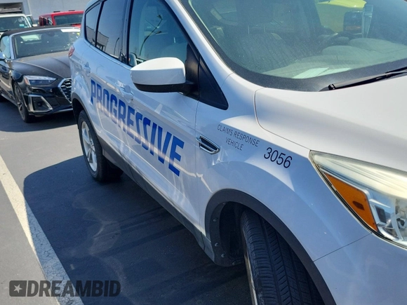 2014 Ford Escape SE with VIN 1FMCU9GX4EUC03056, listed as a IAAI auction lot 42293273 with 92,444 mi miles and . Bid and sale history available at DreamBid. Image 1.