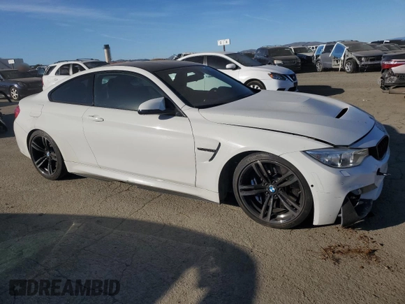 2015 BMW M4 with VIN WBS3R9C59FK334290, listed as a Copart auction lot 87755955 with 59,403 mi miles and Salvage Title. Bid and sale history available at carsss.com. Image 4.
