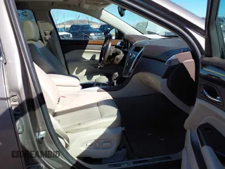 2012 Cadillac SRX Luxury Collection with VIN 3GYFNAE35CS549902, listed as a IAAI auction lot 41575145 with 201,054 mi miles and . Bid and sale history available at carsss.com. Image 5.