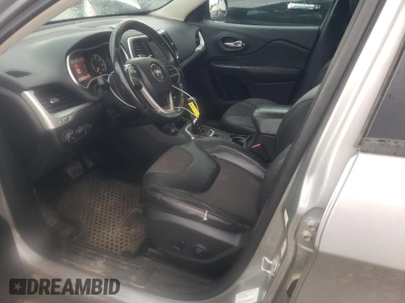 2014 Jeep Cherokee Trailhawk with VIN 1C4PJMBS1EW240177, listed as a Copart auction lot 43321715 with 212,339 mi miles and Salvage title. Bid and sale history available at DreamBid. Image 7.