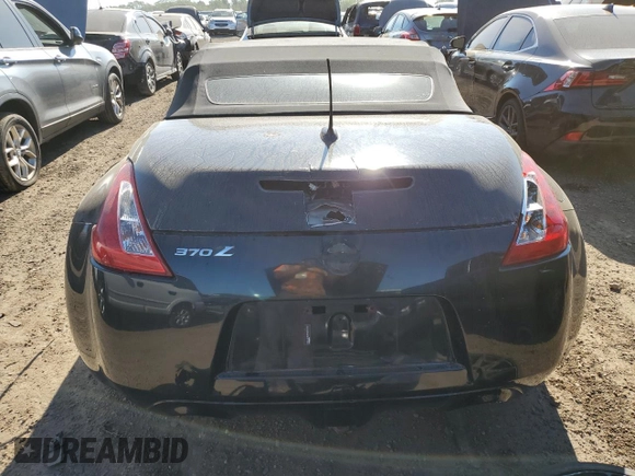 2012 Nissan 370Z Touring z VIN JN1AZ4FHXCM370659, wystawiony jako Copart lot #69714024 z przebiegiem Nie podano mil oraz Czysty tytuł • Clean title. Historia ofert i sprzedaży dostępna na DreamBid. Obrazek 6.