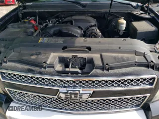 2011 Chevrolet Suburban LT z VIN 1GNSKJE31BR148448, wystawiony jako Copart lot #61057955 z przebiegiem 237 656 mil mil oraz Czysty tytuł • Clean title. Historia ofert i sprzedaży dostępna na DreamBid. Obrazek 11.