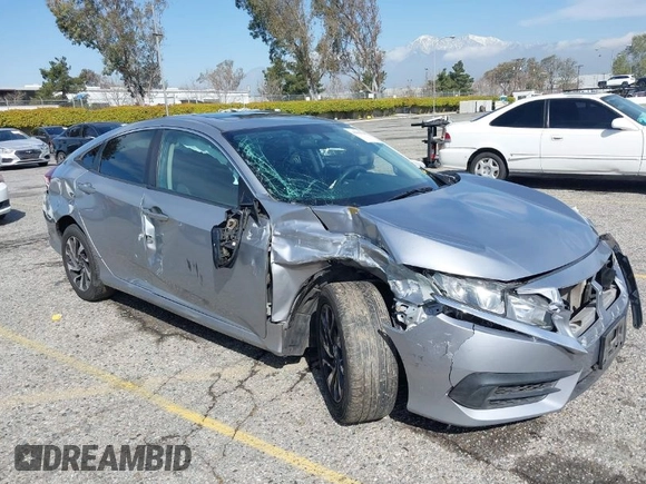 2016 Honda Civic Sedan EX with VIN 2HGFC2F74GH563268, listed as a IAAI auction lot 41805038 with 125,577 mi miles. Bid and sale history available at carsss.com. Image 1.