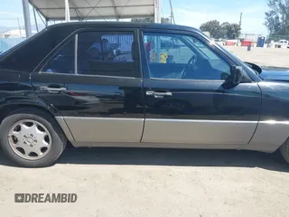 1993 Mercedes-Benz 400 with VIN WDBEA34E6PB942402, listed as a IAAI auction lot 41855899 with 124,065 mi miles. Bid and sale history available at carsss.com. Image 13.