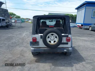 2004 Jeep Wrangler Sport with VIN 1J4FA49S04P781581, listed as a IAAI auction lot 42078693 with 111,123 mi miles and . Bid and sale history available at DreamBid. Image 16.