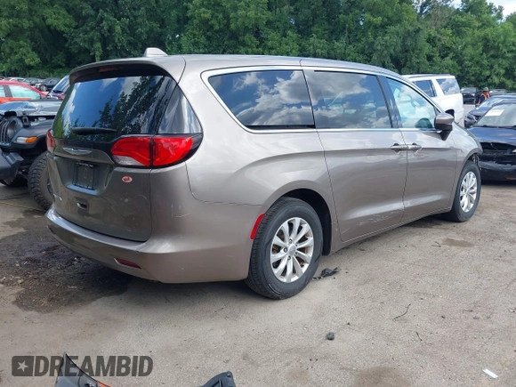 2017 Chrysler Pacifica Touring z VIN 2C4RC1DG2HR833473, wystawiony jako IAAI lot #42597208 z przebiegiem 78 239 mil mil oraz . Historia ofert i sprzedaży dostępna na DreamBid. Obrazek 4.