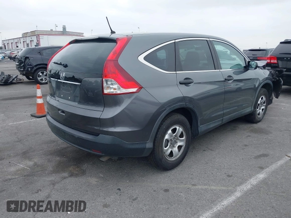 2014 Honda CR-V LX with VIN 3CZRM3H32EG715290, listed as a IAAI auction lot 42178372 with 90,934 mi miles and . Bid and sale history available at carsss.com. Image 4.