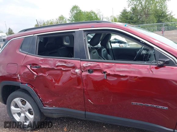 2021 Jeep Compass Latitude with VIN 3C4NJDBBXMT504993, listed as a IAAI auction lot 42181872 with 56,053 mi miles and . Bid and sale history available at DreamBid. Image 6.