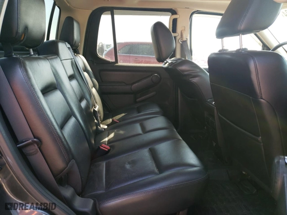 2010 Ford Explorer Sport Trac Limited with VIN 1FMEU3DE7AUA02366, listed as a Copart auction lot 76955404 with 128,751 mi miles and Salvage Title. Bid and sale history available at carsss.com. Image 10.