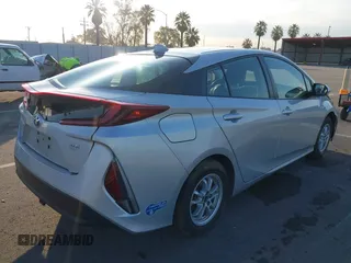 2021 Toyota Prius LE with VIN JTDKAMFP1M3196066, listed as a IAAI auction lot 41752179 with 90,200 mi miles and . Bid and sale history available at DreamBid. Image 4.