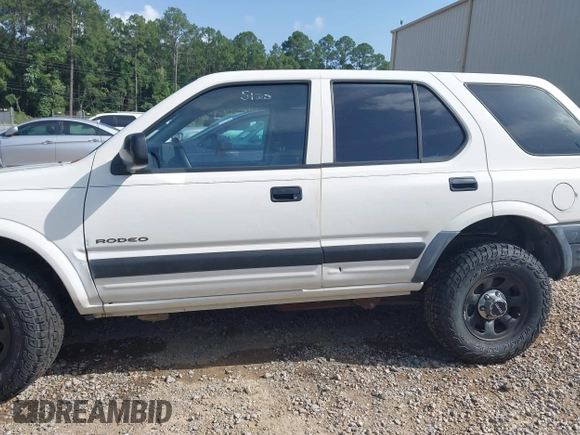 1998 Isuzu Rodeo with VIN 4S2CK58D3W4301606, listed as a IAAI auction lot 42453329 with 219,433 mi miles and . Bid and sale history available at DreamBid. Image 14.