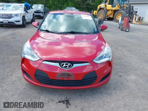 2012 Hyundai Veloster w/Gray Int z VIN KMHTC6AD7CU036446, wystawiony jako IAAI lot #42267057 z przebiegiem 110 564 mil mil oraz . Historia ofert i sprzedaży dostępna na DreamBid. Obrazek 6.