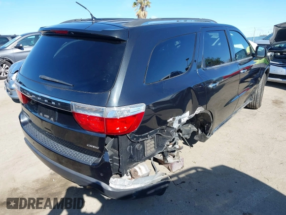 2013 Dodge Durango Crew with VIN 1C4RDHDG1DC666094, listed as a IAAI auction lot 41940121 with 93,131 mi miles and . Bid and sale history available at carsss.com. Image 4.