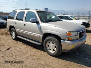 2004 GMC Yukon SLT with VIN 1GKEK13Z34J235318, listed as a Copart auction lot 74971334 with 189,771 mi miles and Salvage Title. Bid and sale history available at carsss.com. Image 4.
