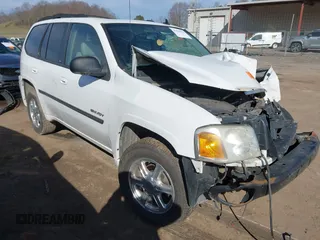 2006 GMC Envoy SLT with VIN 1GKDT13S962320043, listed as a IAAI auction lot 41834076 with 1 mi miles. Bid and sale history available at carsss.com. Image 1.