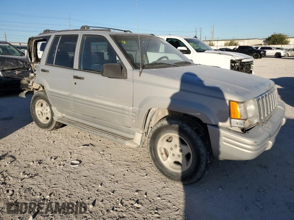 1998 Jeep Grand Cherokee with VIN 1J4FX48S4WC345469, listed as a Copart auction lot 80721224 with 201,543 mi miles and Salvage title. Bid and sale history available at DreamBid. Image 4.