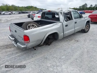 2003 Dodge Dakota SLT with VIN 1D7HL48N13S274856, listed as a IAAI auction lot 41954038 with 306,728 mi miles. Bid and sale history available at carsss.com. Image 4.