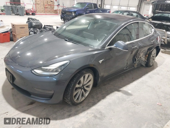 2018 Tesla Model 3 Long Range Battery with VIN 5YJ3E1EB1JF145520, listed as a IAAI auction lot 41360939 with 95,010 mi miles and . Bid and sale history available at DreamBid. Image 19.