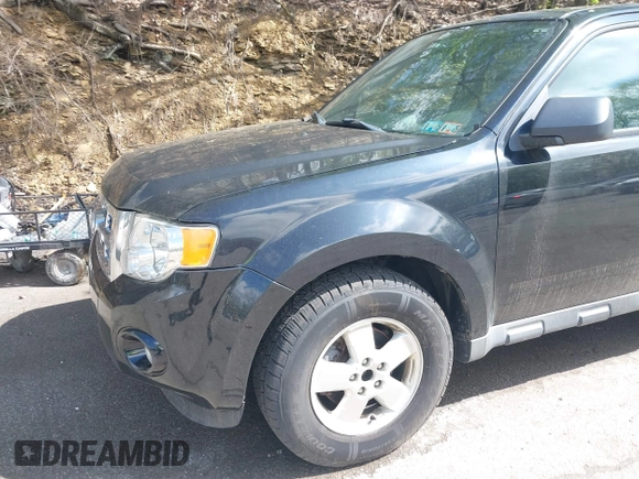 2010 Ford Escape XLT z VIN 1FMCU9DGXAKD25432, wystawiony jako IAAI lot #42195798 z przebiegiem 135 080 mil mil oraz . Historia ofert i sprzedaży dostępna na DreamBid. Obrazek 16.