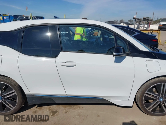 2017 BMW i3 z VIN WBY1Z8C31HV894473, wystawiony jako IAAI lot #41870525 z przebiegiem 96 414 mil mil oraz . Historia ofert i sprzedaży dostępna na DreamBid. Obrazek 13.