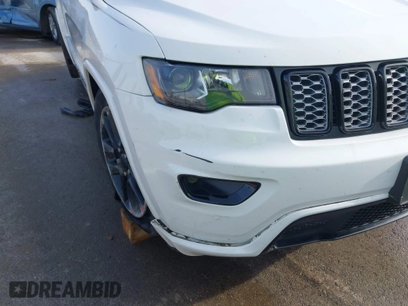 2017 Jeep Grand Cherokee Laredo with VIN 1C4RJFAG7HC700546, listed as a IAAI auction lot 40961293 with 83,702 mi miles and . Bid and sale history available at DreamBid. Image 6.