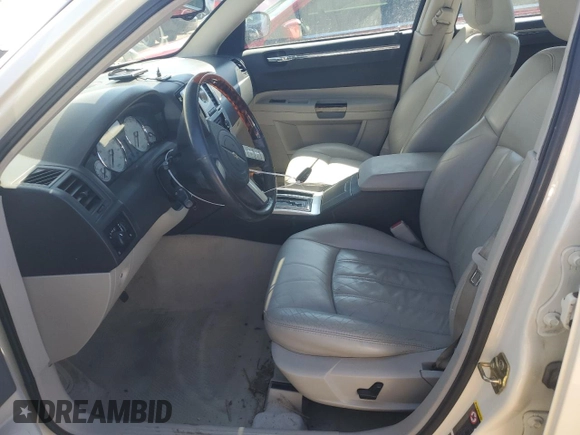 2005 Chrysler 300 with VIN 2C3AA63H05H125190, listed as a Copart auction lot 44228235 with 150,745 mi miles and Salvage Title. Bid and sale history available at carsss.com. Image 7.