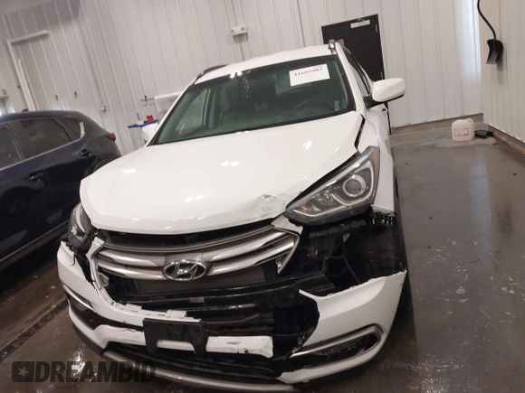 2017 Hyundai Santa Fe 2.4L z VIN 5XYZU3LBXHG444308, wystawiony jako IAAI lot #41685902 z przebiegiem 70 838 mil mil oraz . Historia ofert i sprzedaży dostępna na DreamBid. Obrazek 12.