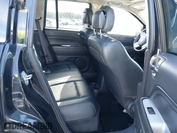 2016 Jeep Compass High Altitude Edition with VIN 1C4NJCEA4GD806612, listed as a IAAI auction lot 41538090 with 104,447 mi miles. Bid and sale history available at carsss.com. Image 8.