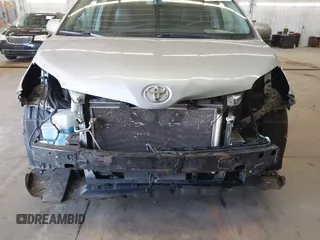 2015 Toyota Sienna SE with VIN 5TDXK3DC9FS527667, listed as a IAAI auction lot 41977729 with 230,933 mi miles and . Bid and sale history available at DreamBid. Image 6.