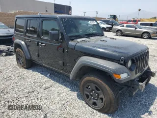 2023 Jeep Wrangler Willys with VIN 1C4HJXDN0PW631045, listed as a Copart auction lot 60109565 with 31,095 mi miles and Salvage title. Bid and sale history available at DreamBid. Image 4.
