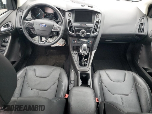 2016 Ford Focus SE z VIN 1FADP3F2XGL223796, wystawiony jako Copart lot #52567505 z przebiegiem Nie podano mil oraz Szkoda całkowita • Salvage title. Historia ofert i sprzedaży dostępna na DreamBid. Obrazek 8.