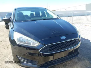 2018 Ford Focus S with VIN 1FADP3E29JL259004, listed as a IAAI auction lot 41841485 with 77,567 mi miles. Bid and sale history available at carsss.com. Image 12.
