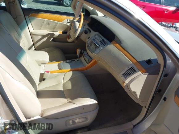 2006 Toyota Avalon XL with VIN 4T1BK36B46U148453, listed as a IAAI auction lot 41740381 with 124,579 mi miles. Bid and sale history available at carsss.com. Image 5.