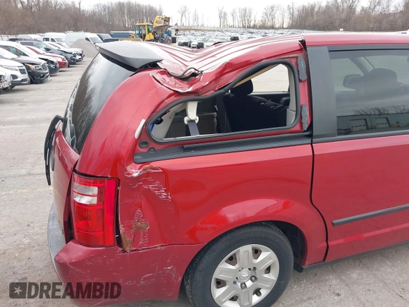 2008 Dodge Grand Caravan SE with VIN 1D8HN44H08B191755, listed as a IAAI auction lot 41895632 with 99,475 mi miles and . Bid and sale history available at DreamBid. Image 11.