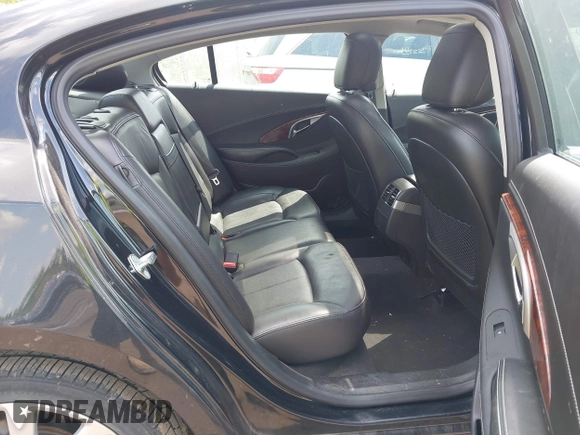 2013 Buick LaCrosse Touring z VIN 1G4GJ5E32DF324710, wystawiony jako IAAI lot #42561005 z przebiegiem 104 881 mil mil oraz . Historia ofert i sprzedaży dostępna na DreamBid. Obrazek 8.