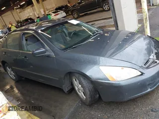 2005 Honda Accord EX with VIN JHMCM56755C007601, listed as a IAAI auction lot 41209511 with 238,715 mi miles and . Bid and sale history available at DreamBid. Image 13.