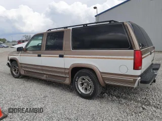 1999 Chevrolet Suburban with VIN 3GNEC16R9XG143471, listed as a Copart auction lot 53856565 with 208,621 mi miles and Salvage title. Bid and sale history available at DreamBid. Image 2.