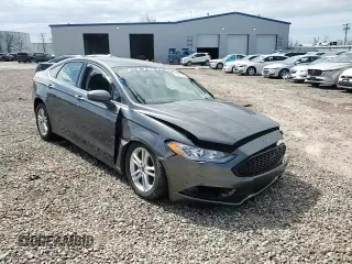 2018 Ford Fusion SE z VIN 3FA6P0H78JR108395, wystawiony jako Copart lot #55308795 z przebiegiem Nie podano mil oraz Szkoda całkowita • Salvage title. Historia ofert i sprzedaży dostępna na DreamBid. Obrazek 14.