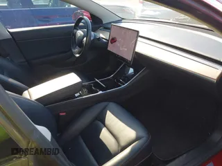 2018 Tesla Model 3 Long Range Battery with VIN 5YJ3E1EA5JF063555, listed as a IAAI auction lot 42028785 with 45,346 mi miles and . Bid and sale history available at DreamBid. Image 5.