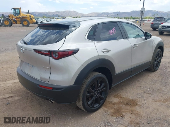2024 Mazda CX-30 S Select Sport with VIN 3MVDMBBM3RM657918, listed as a IAAI auction lot 42218316 with 27,595 mi miles and . Bid and sale history available at carsss.com. Image 4.