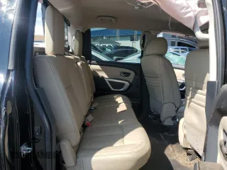 2017 Nissan Titan SV z VIN 1N6AA1E51HN571617, wystawiony jako Copart lot #71640544 z przebiegiem 89 088 mil mil oraz Szkoda całkowita • Salvage title. Historia ofert i sprzedaży dostępna na DreamBid. Obrazek 10.