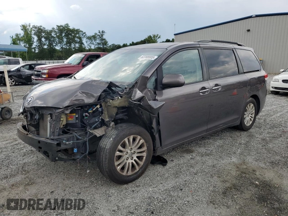 2012 Toyota Sienna XLE AAS with VIN 5TDYK3DC0CS251735, listed as a Copart auction lot 62208805 with 217,504 mi miles and Clean title. Bid and sale history available at DreamBid. Image 1.