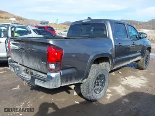 2022 Toyota Tacoma 4WD SR with VIN 3TYCZ5AN0NT056524, listed as a IAAI auction lot 41454556 with 49,871 mi miles. Bid and sale history available at carsss.com. Image 4.