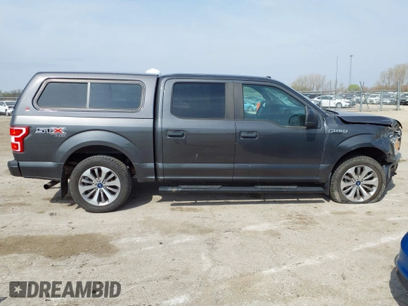 2018 Ford F-150 XL with VIN 1FTEW1EP9JKF56149, listed as a IAAI auction lot 42066727 with 73,689 mi miles and . Bid and sale history available at DreamBid. Image 13.