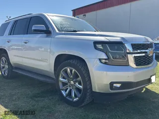 2020 Chevrolet Tahoe LT with VIN 1GNSKBKCXLR262492, listed as a Copart auction lot 53185735 with 99,627 mi miles and Clean Title. Bid and sale history available at carsss.com. Image 1.
