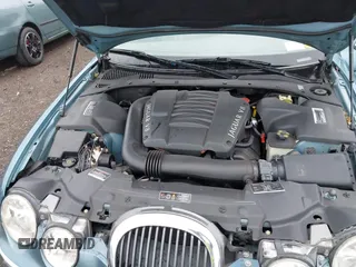 2000 Jaguar S-Type V8 z VIN SAJDA01D0YGL07334, wystawiony jako IAAI lot #42365276 z przebiegiem 63 379 mil mil oraz . Historia ofert i sprzedaży dostępna na DreamBid. Obrazek 10.