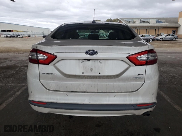 2013 Ford Fusion SE z VIN 3FA6P0HR4DR362689, wystawiony jako Copart lot #66106765 z przebiegiem 137 639 mil mil oraz Czysty tytuł • Clean title. Historia ofert i sprzedaży dostępna na DreamBid. Obrazek 6.