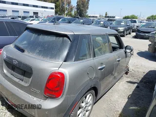 2019 MINI Hardtop 4 Door Cooper with VIN WMWXU1C59K2L24715, listed as a IAAI auction lot 41398540 with 6,052 mi miles and . Bid and sale history available at DreamBid. Image 4.